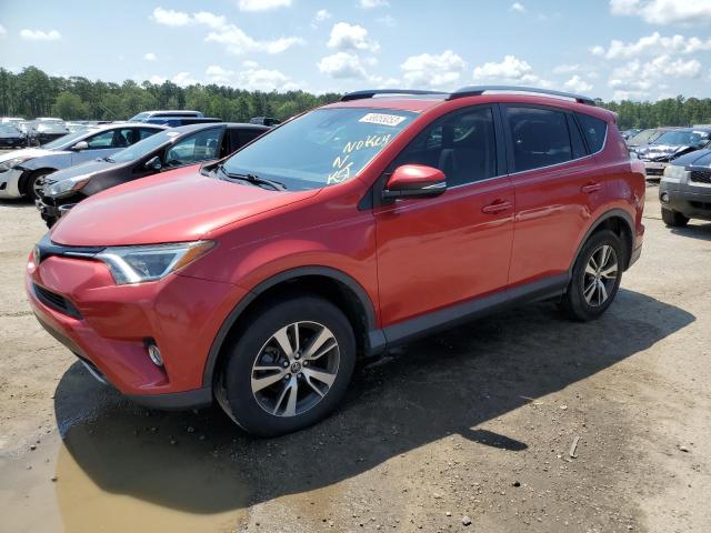 TOYOTA RAV4 XLE 2017 with VIN JTMWFREV9HJ136604 - Photo from auction