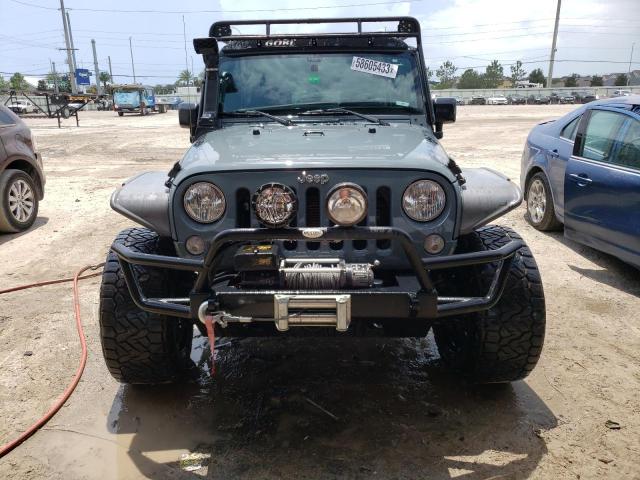 Photo 5 from auction – 2014 JEEP WRANGLER U with VIN 1C4BJWDG6EL157215