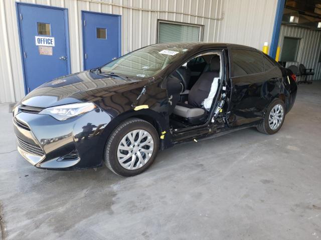 TOYOTA COROLLA L 2019 with VIN 5YFBURHE7KP863615 - Photo from auction