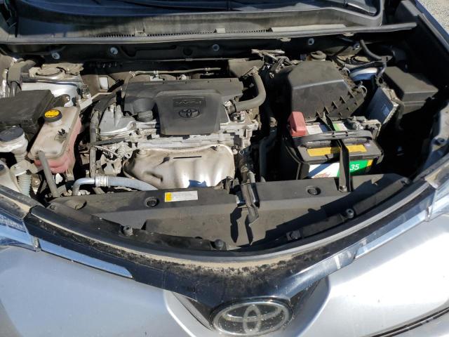 Photo 12 from auction – 2018 TOYOTA RAV4 LE with VIN 2T3ZFREV7JW475527