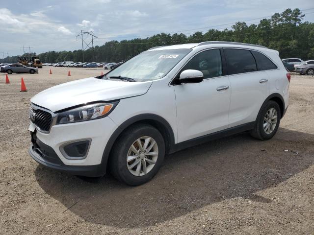 KIA SORENTO LX 2016 with VIN 5XYPG4A35GG048401 - Photo from auction