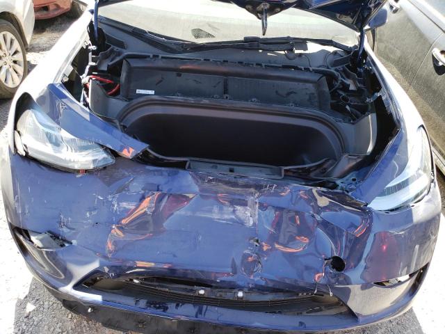 Photo 11 from auction – 2023 TESLA MODEL Y with VIN 7SAYGDEE4PA129557