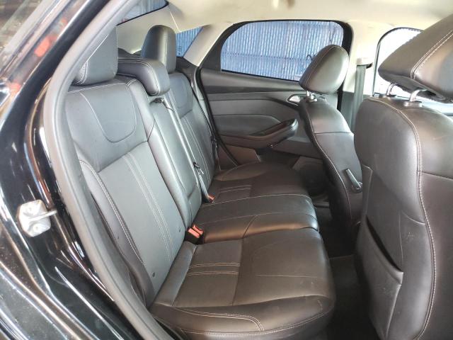 Photo 10 from auction – 2014 FORD FOCUS TITA with VIN 1FADP3J27EL294667