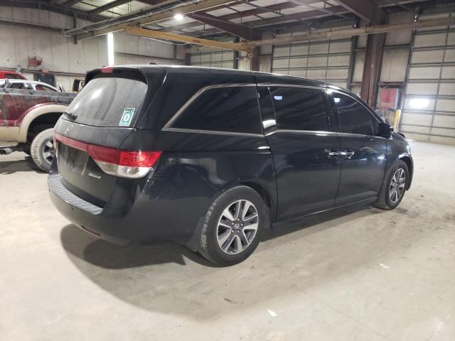 Photo 3 from auction – 2014 HONDA ODYSSEY TO with VIN 5FNRL5H99EB128941