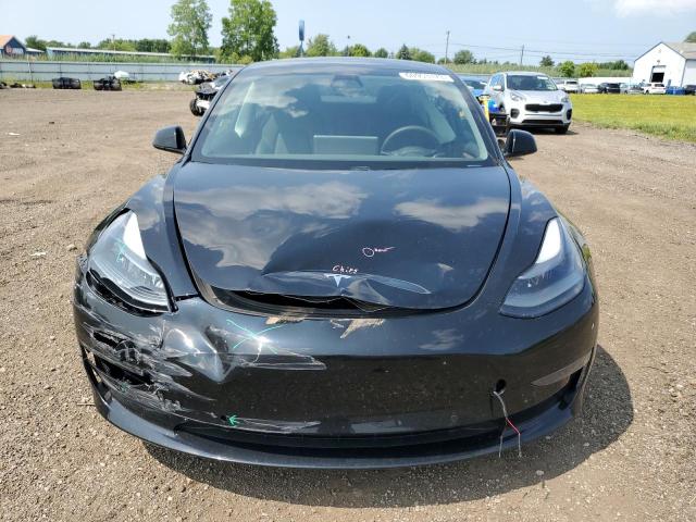 Photo 5 from auction – 2021 TESLA MODEL 3 with VIN 5YJ3E1EA5MF991399