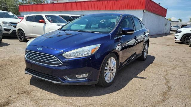 Photo 2 from auction – 2016 FORD FOCUS TITA with VIN 1FADP3J21GL233771