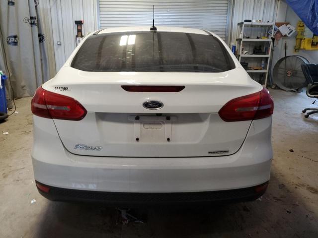Photo 6 from auction – 2016 FORD FOCUS S with VIN 1FADP3E25GL395042