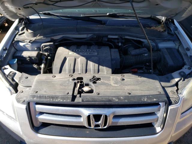 Photo 12 from auction – 2006 HONDA PILOT EX with VIN 2HKYF18496H500233