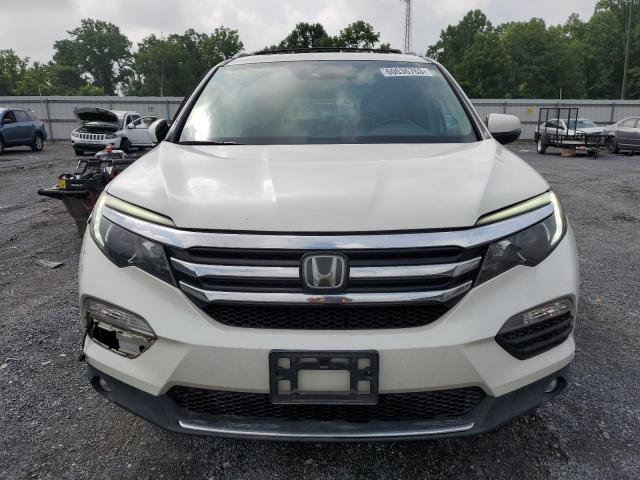 Photo 5 from auction – 2017 HONDA PILOT TOUR with VIN 5FNYF6H9XHB021409