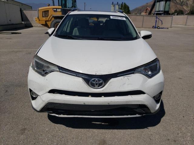 Photo 5 from auction – 2016 TOYOTA RAV4 XLE with VIN JTMWFREV8GJ085272