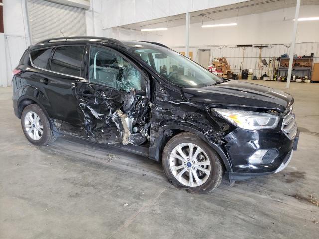 Photo 4 from auction – 2017 FORD ESCAPE SE with VIN 1FMCU9G90HUC79783