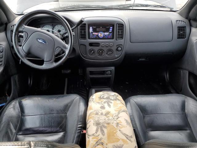 Photo 8 from auction – 2003 FORD ESCAPE LIM with VIN 1FMCU04103KB89564