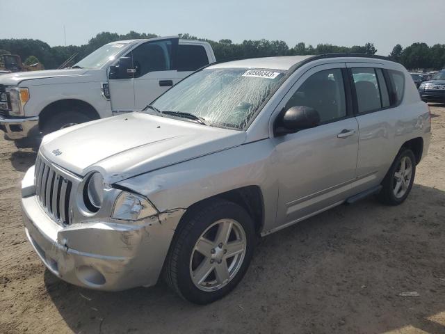 JEEP COMPASS SP 2010 with VIN 1J4NT4FB6AD677975 - Photo from auction