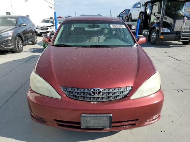 Photo 5 from auction – 2002 TOYOTA CAMRY LE with VIN JTDBE32K520059929