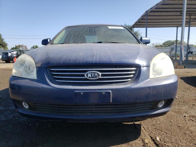 Photo 5 from auction – 2006 KIA OPTIMA LX with VIN KNAGE124865000472