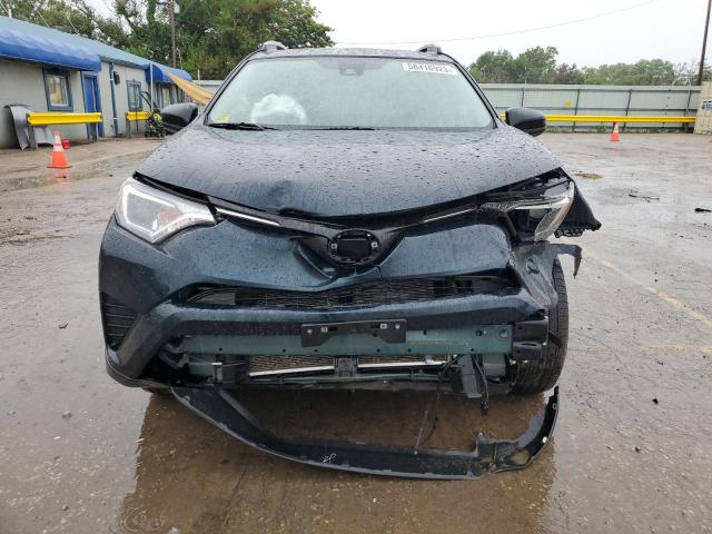 Photo 5 from auction – 2018 TOYOTA RAV4 LE with VIN JTMBFREV3JJ251381