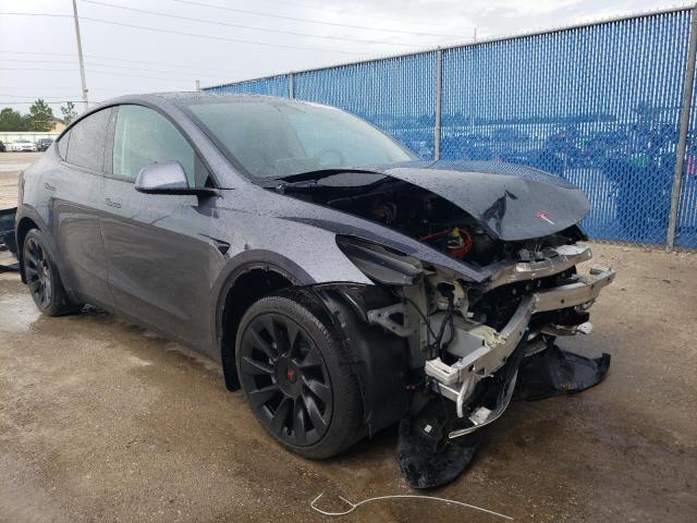 Photo 4 from auction – 2022 TESLA MODEL Y with VIN 7SAYGDEE6NF314998