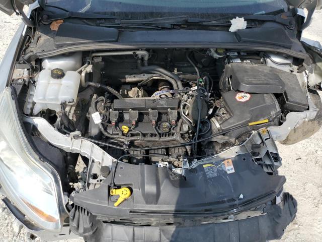 Photo 11 from auction – 2014 FORD FOCUS SE with VIN 1FADP3F27EL204300
