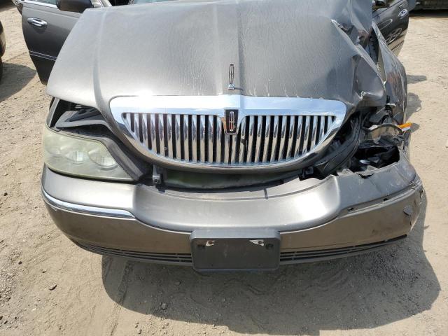 Photo 11 from auction – 2003 LINCOLN TOWN CAR E with VIN 1LNHM81W23Y650832