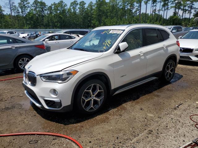 BMW X1 XDRIVE2 2017 with VIN WBXHT3C36H5F79419 - Photo from auction