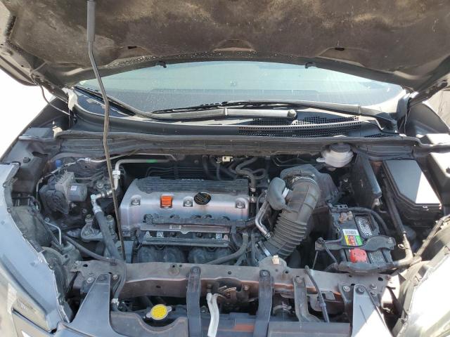 Photo 12 from auction – 2014 HONDA CR-V with VIN 5J6RM3H76EL003340