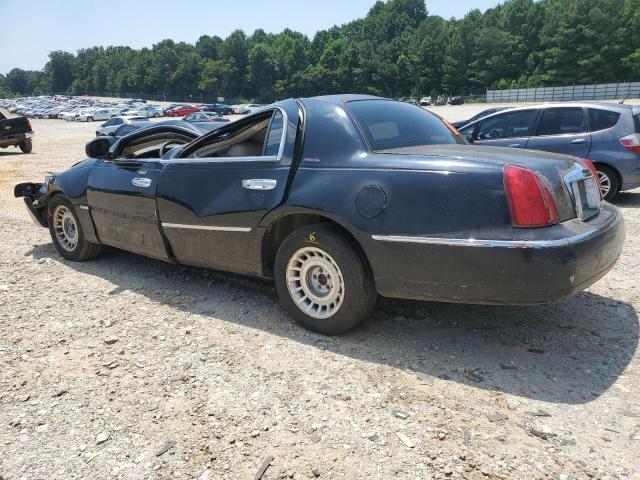 Photo 2 from auction – 2001 LINCOLN TOWN CAR E with VIN 1LNHM81W91Y684103