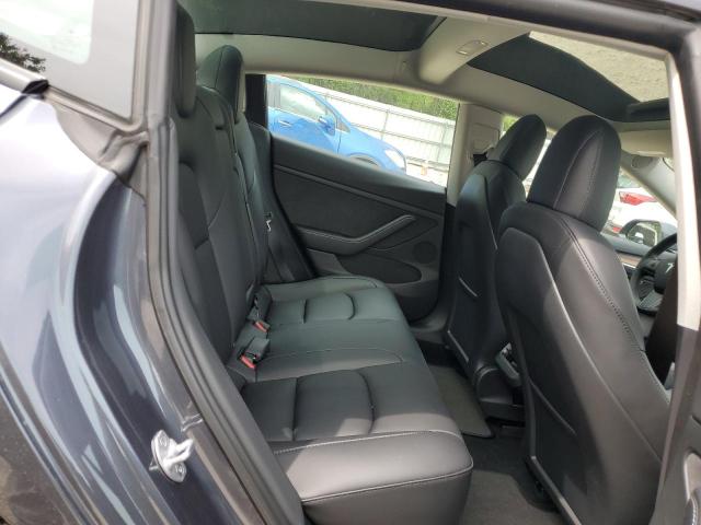 Photo 10 from auction – 2023 TESLA MODEL 3 with VIN 5YJ3E1EA4PF406560