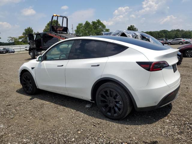 Снимка 2 от търг – 2023 TESLA MODEL Y с VIN 7SAYGDEE6PF760183