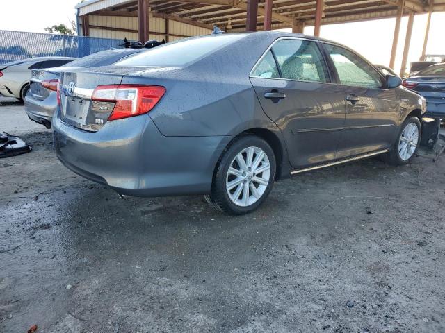 Photo 3 from auction – 2013 TOYOTA CAMRY HYBR with VIN 4T1BD1FK0DU074444