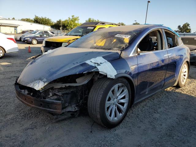 TESLA MODEL X 2016 with VIN 5YJXCAE29GF001679 - Photo from auction