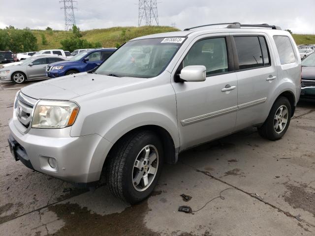 HONDA PILOT TOUR 2010 with VIN 5FNYF4H95AB003748 - Photo from auction