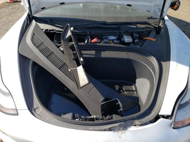 Photo 11 from auction – 2018 TESLA MODEL 3 with VIN 5YJ3E1EB8JF100249
