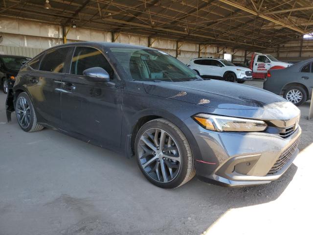 Photo 4 from auction – 2023 HONDA CIVIC TOUR with VIN 2HGFE1F96PH306909