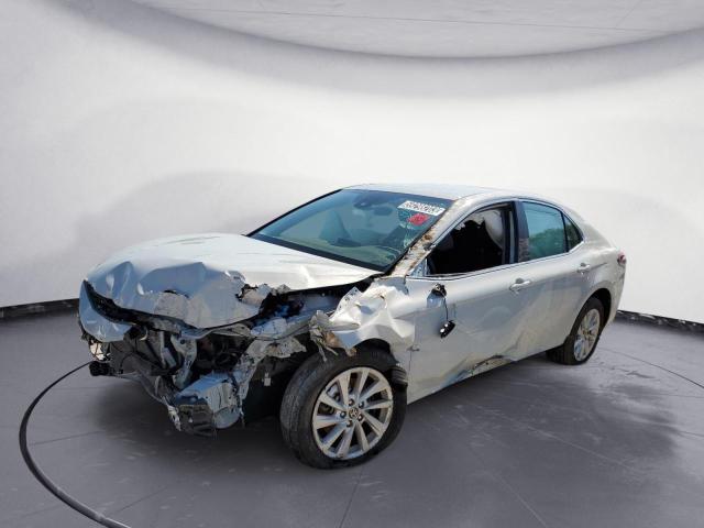 TOYOTA CAMRY LE 2023 with VIN 4T1C11AK3PU092140 - Photo from auction