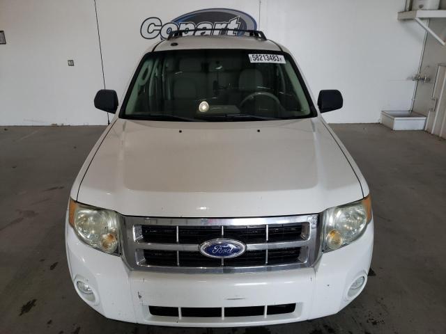 Photo 5 from auction – 2011 FORD ESCAPE with VIN 1FMCU0D77BKB93033