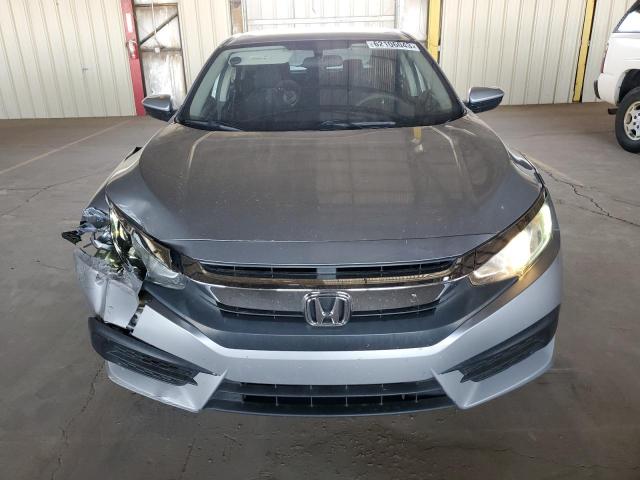 Photo 5 from auction – 2018 HONDA CIVIC LX with VIN 19XFC2F51JE017902