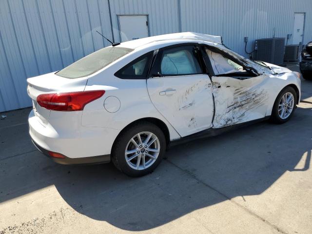 Photo 3 from auction – 2018 FORD FOCUS SE with VIN 1FADP3F28JL272454