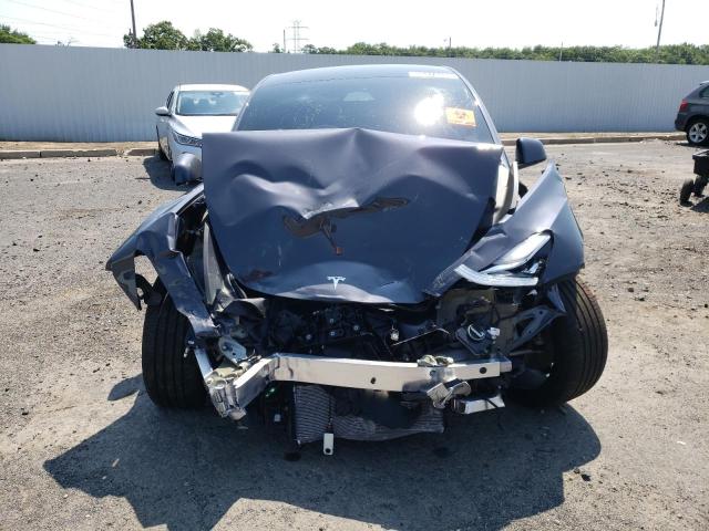 Photo 5 from auction – 2022 TESLA MODEL Y with VIN 7SAYGDEE4NF480162