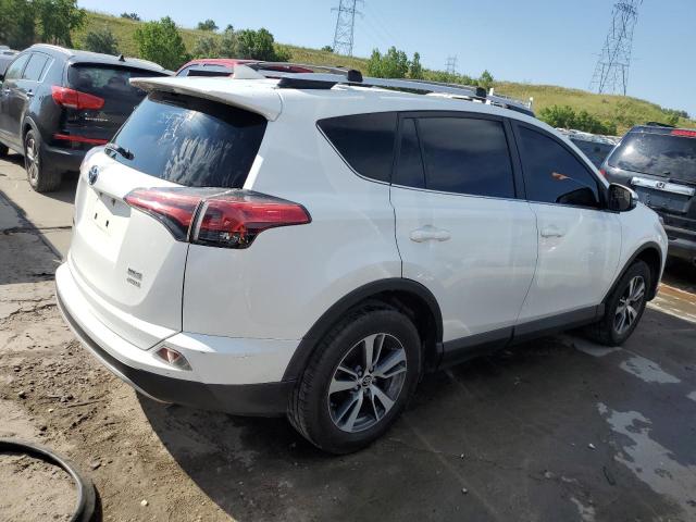 Photo 3 from auction – 2016 TOYOTA RAV4 XLE with VIN JTMRFREV6GJ090659