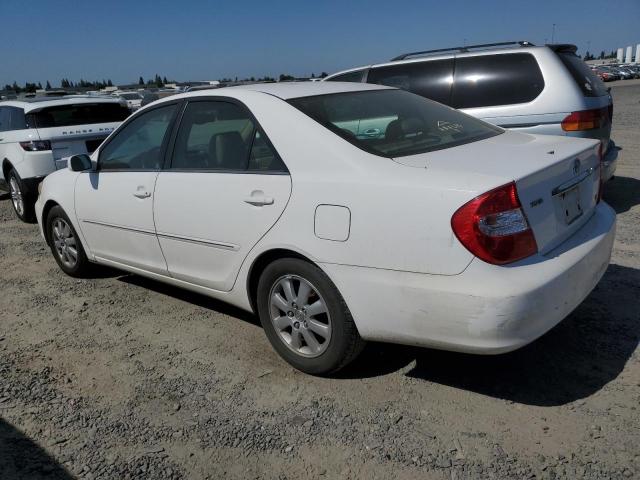 Photo 2 from auction – 2002 TOYOTA CAMRY LE with VIN JTDBF30KX20019295