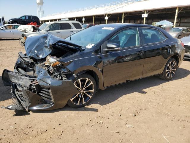 TOYOTA COROLLA 2019 with VIN 5YFBURHE4KP909658 - Photo from auction