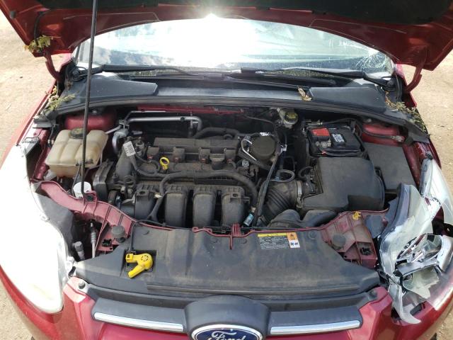 Foto 11 de la subasta – 2014 FORD FOCUS SE con VIN 1FADP3K27EL110472
