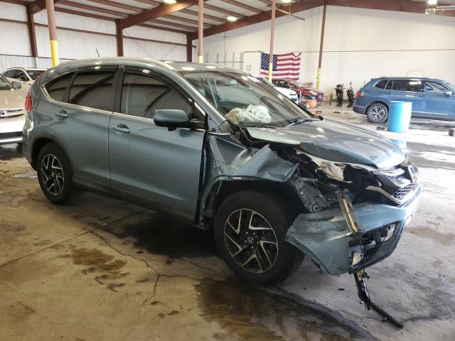 Photo 4 from auction – 2015 HONDA CR-V EXL with VIN 2HKRM3H73FH541733