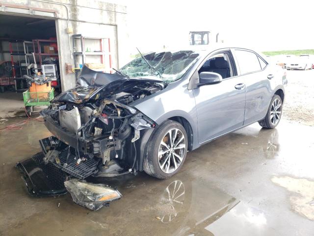 TOYOTA COROLLA L 2017 with VIN 5YFBURHE1HP580779 - Photo from auction