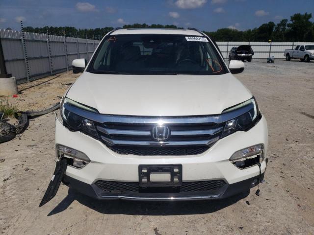 Photo 5 from auction – 2017 HONDA PILOT TOUR with VIN 5FNYF6H96HB009418