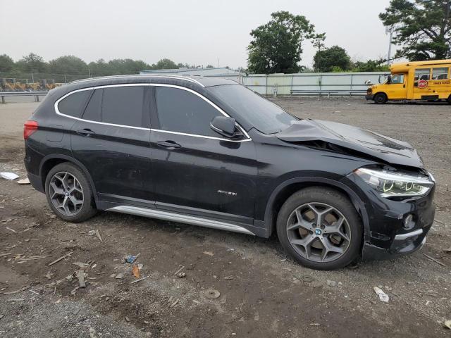 Photo 4 from auction – 2017 BMW X1 XDRIVE2 with VIN WBXHT3C33H5F87932