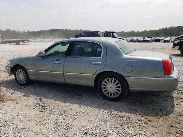 Photo 2 from auction – 2004 LINCOLN TOWN CAR E with VIN 1LNHM81WX4Y606823