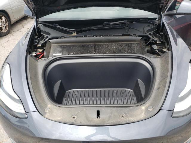 Photo 12 from auction – 2022 TESLA MODEL Y with VIN 7SAYGDEE1NA015710