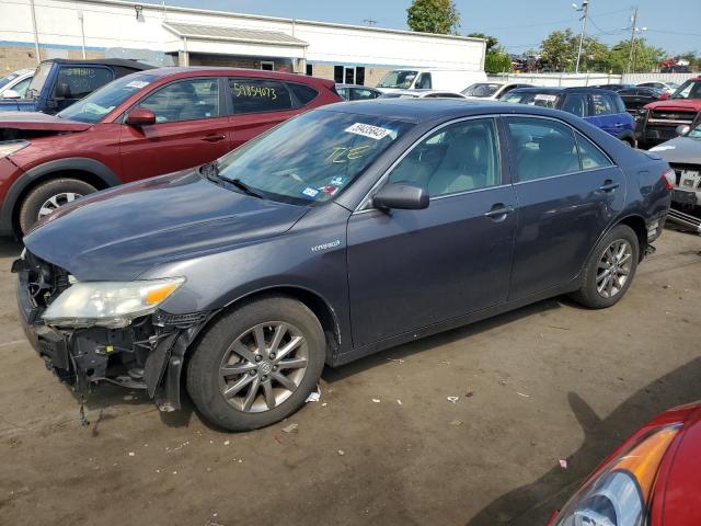TOYOTA CAMRY HYBR 2011 with VIN 4T1BB3EK9BU134074 - Photo from auction