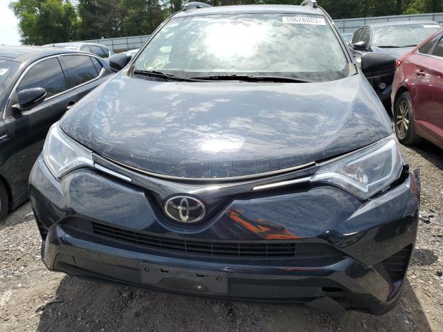 Photo 5 from auction – 2017 TOYOTA RAV4 LE with VIN JTMZFREV7HJ118521